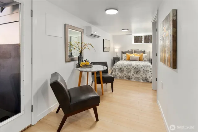 a bedroom with a bed and lamp