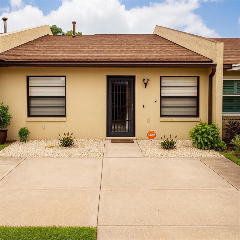 a house view with a outdoor space
