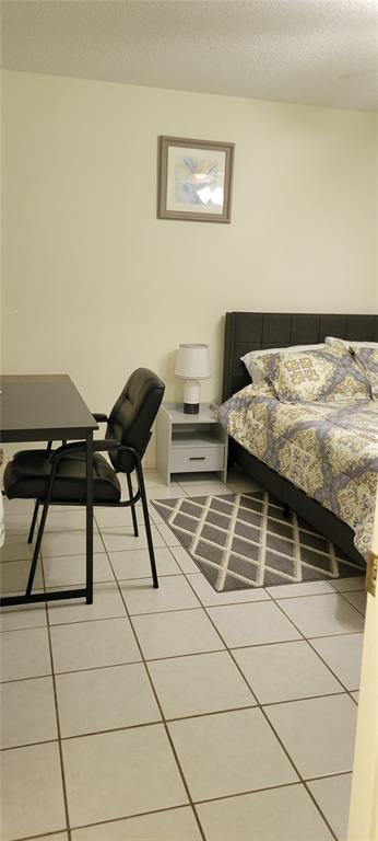 2218 Abbey Road Southwest Winter Haven, FL 33880 - Photo 15 of 31 a living room with a couch