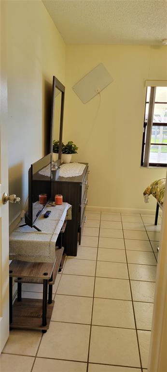 2218 Abbey Road Southwest Winter Haven, FL 33880 - Photo 19 of 31 a room with a sink and a mirror