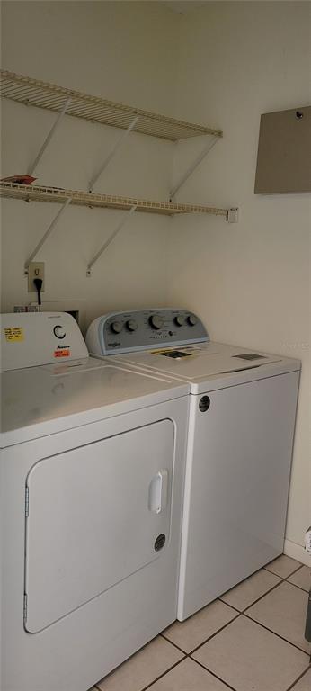 2218 Abbey Road Southwest Winter Haven, FL 33880 - Photo 25 of 31 a utility room with dryer and washer