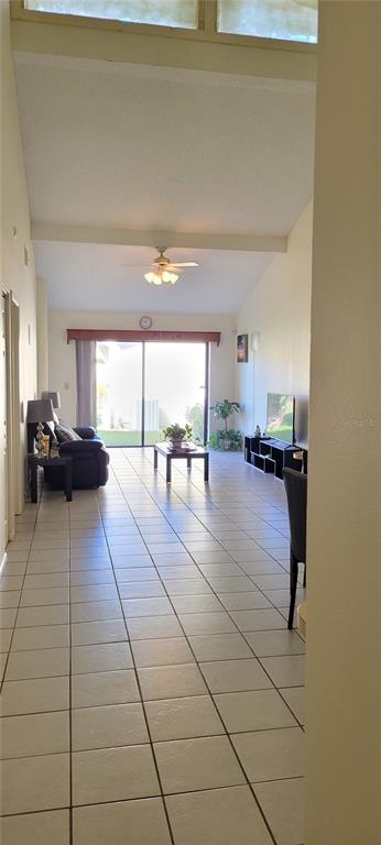 2218 Abbey Road Southwest Winter Haven, FL 33880 - Photo 10 of 31 a lobby with furniture and a floor to ceiling window