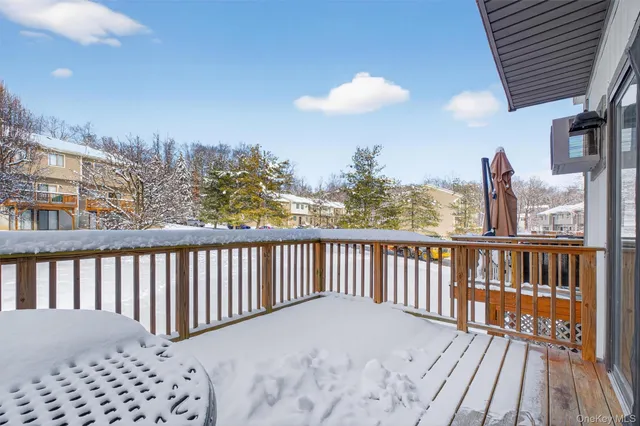 a view of balcony with furniture