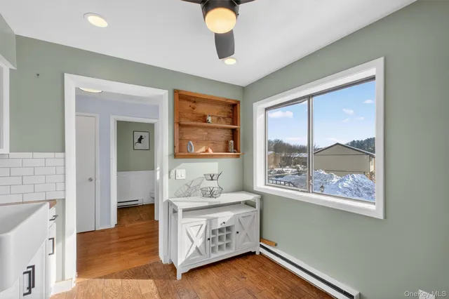 a room with window and bathroom