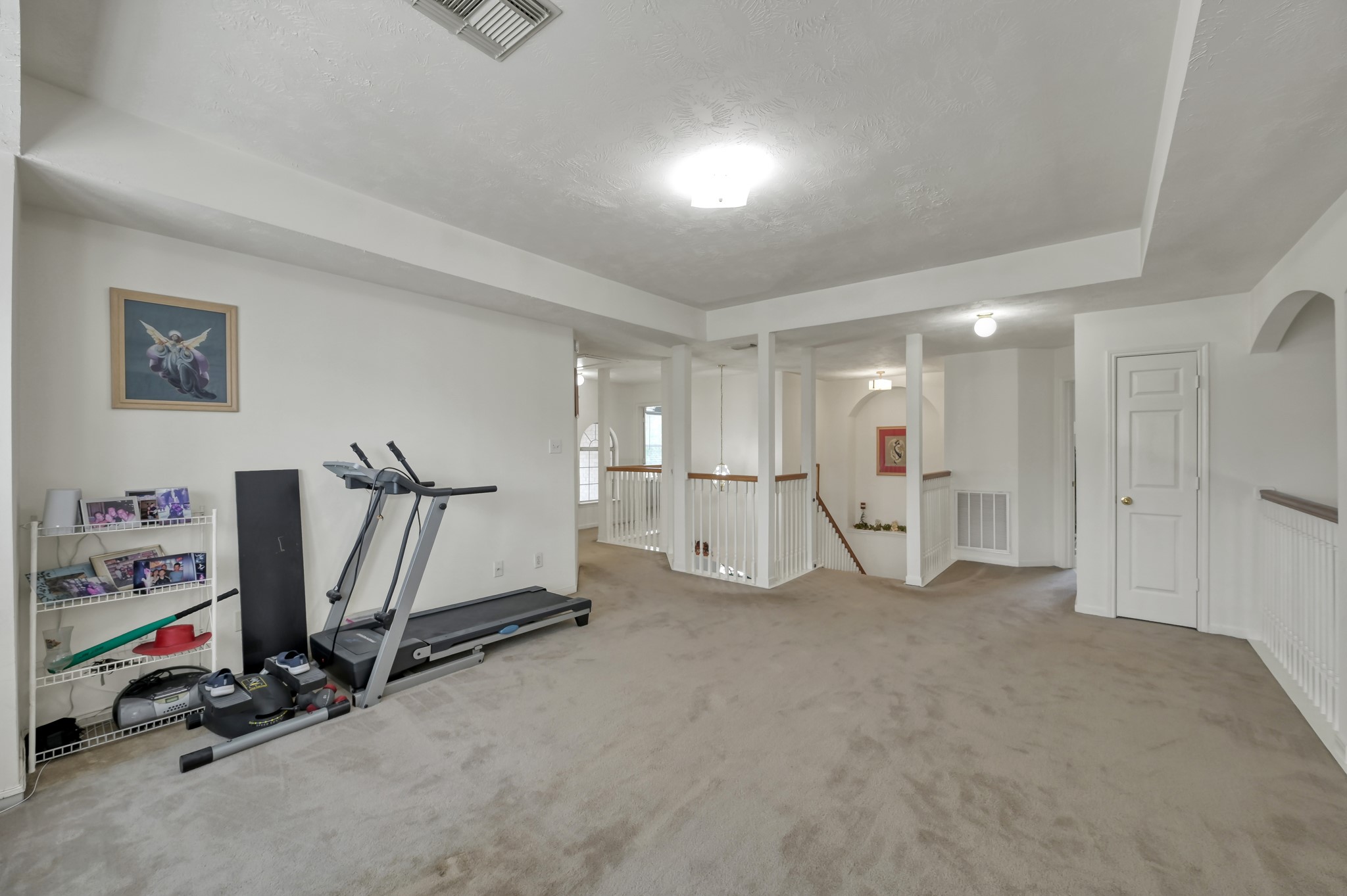2539 Forge Creek Road Houston, TX 77067 - Photo 28 of 40 Alternate view of the upstairs game room. The game room overlooks both the living room and the entryway.