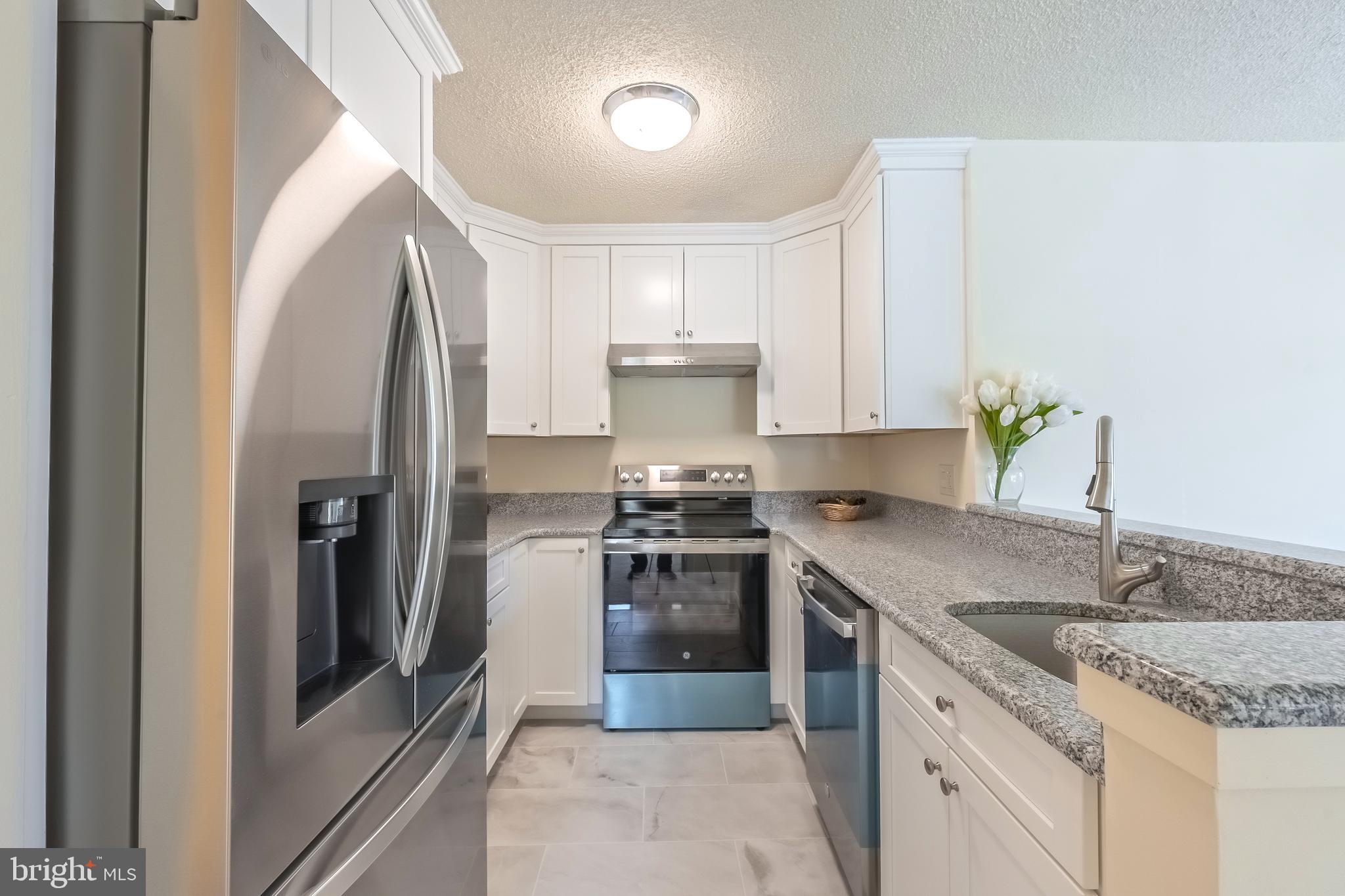 11731 A Summerchase Circle Reston, VA 20194 - Photo 12 of 27 New tile floor,appliances and cabinets