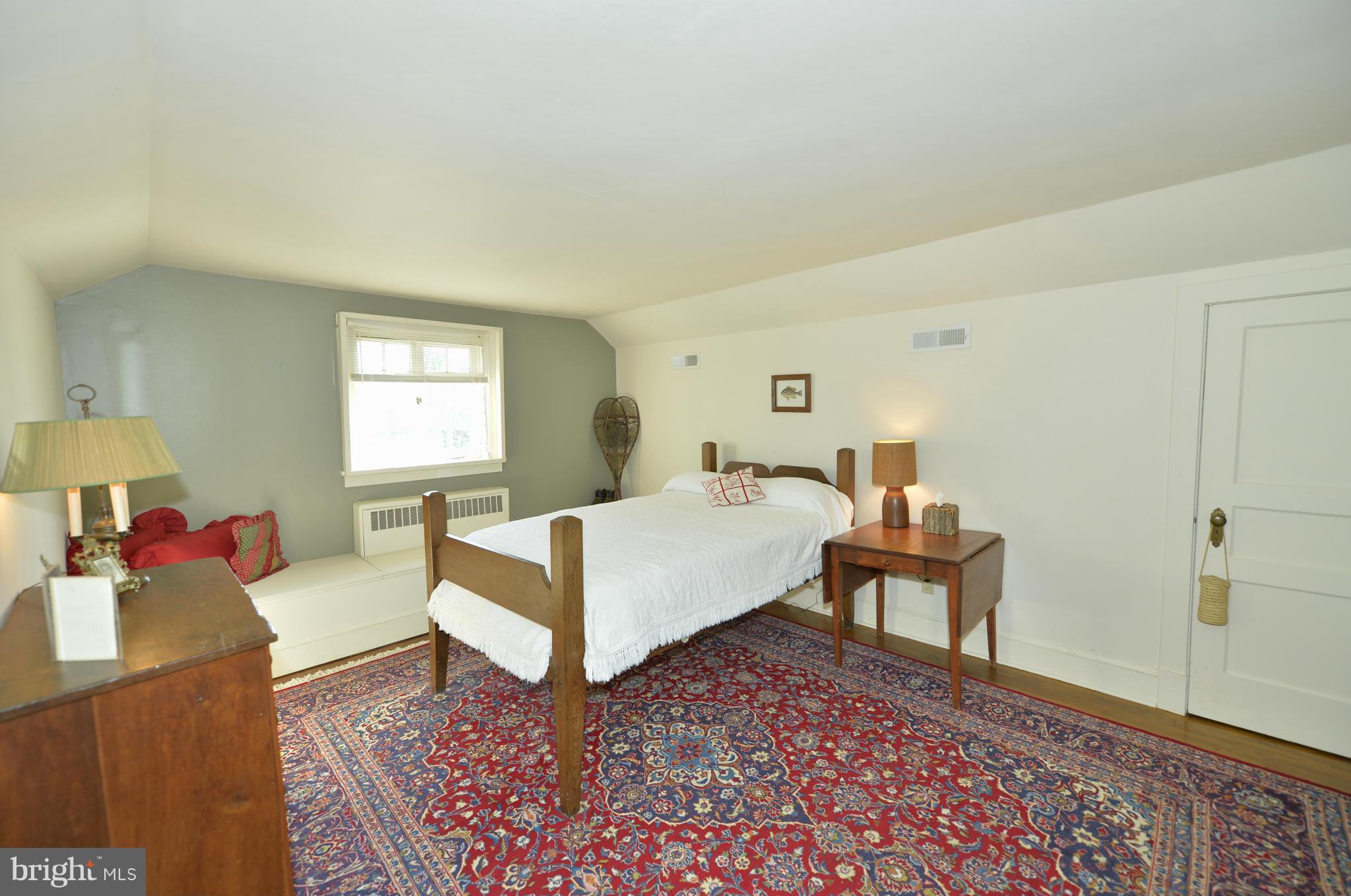 18116 Raven Rocks Road Round Hill, VA 20141 - Photo 22 of 30 a living room with furniture and a window