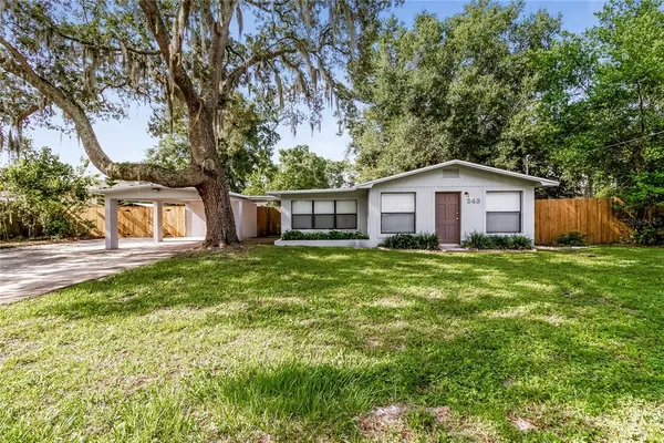 a house view with a garden space