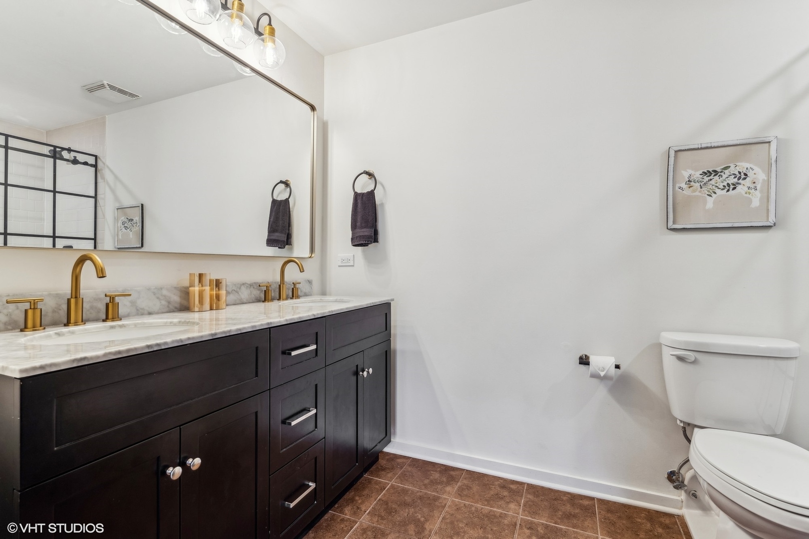 1040 West Adams Street, Unit 308 Chicago, IL 60607 - Photo 18 of 40 a bathroom with a granite countertop sink a toilet and a mirror