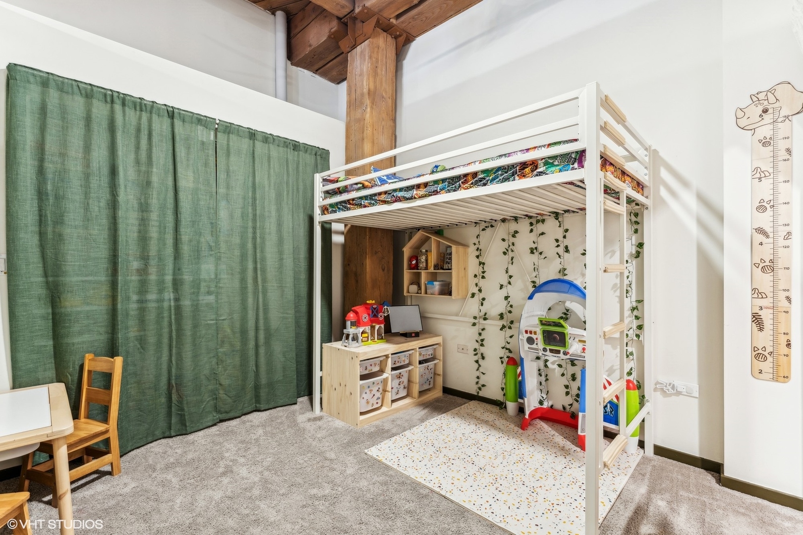 1040 West Adams Street, Unit 308 Chicago, IL 60607 - Photo 21 of 40 a view of a bedroom with baby crib and a window