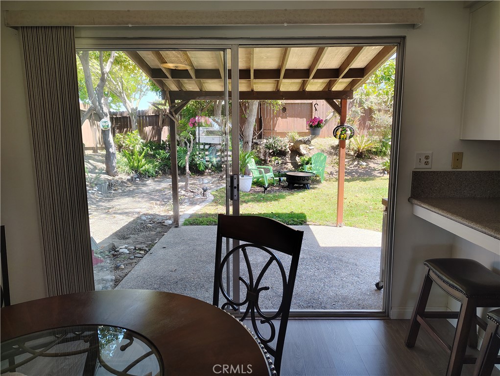 398 Day Road Ventura, CA 93003 - Photo 18 of 69 a view of a porch with furniture and a yard