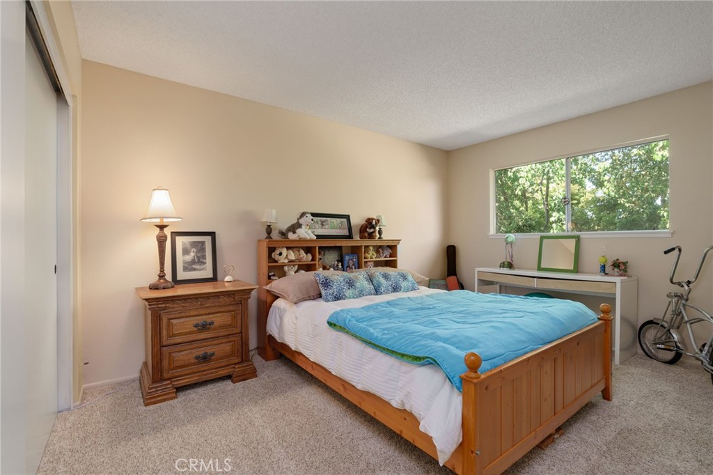 398 Day Road Ventura, CA 93003 - Photo 44 of 69 a bed sitting in a bedroom next to a window