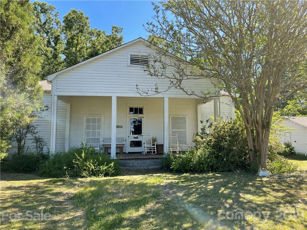 3115 Powe Road Wallace, SC 29596 - Photo 1 of 8 a view of a house with a yard