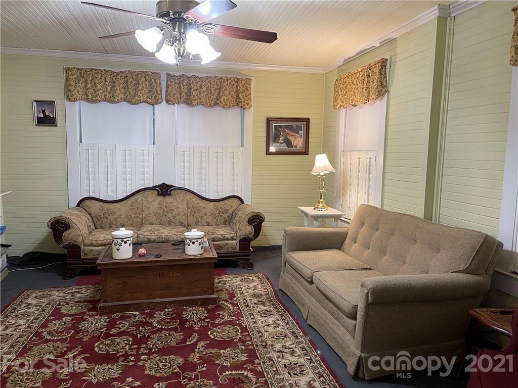 3115 Powe Road Wallace, SC 29596 - Photo 6 of 8 a living room with furniture and a window