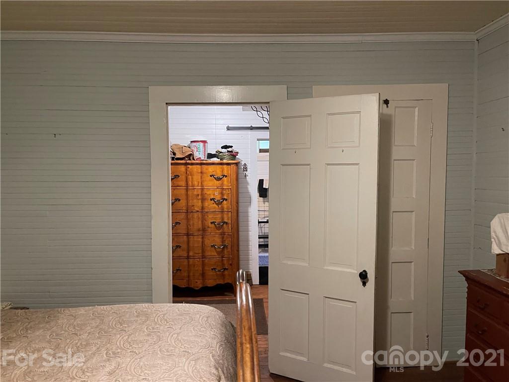 3115 Powe Road Wallace, SC 29596 - Photo 8 of 8 a bedroom with a bed and a walk in closet