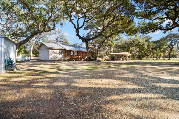 a house view with a outdoor space