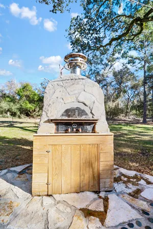 a view of a park with swings and slides
