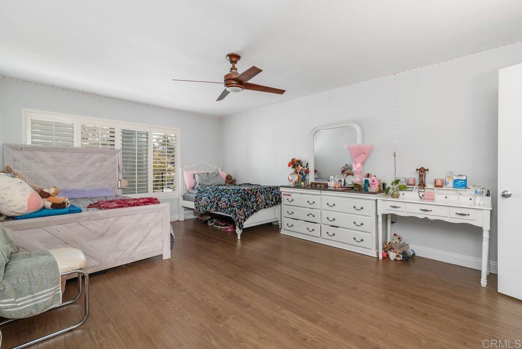 2340 Hosp Way, Unit 120 Carlsbad, CA 92008 - Photo 20 of 33 a living room with furniture and a wooden floor