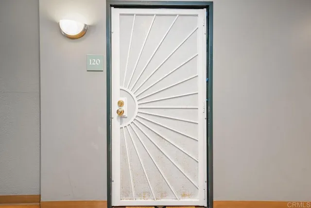 a view of staircase with white walls