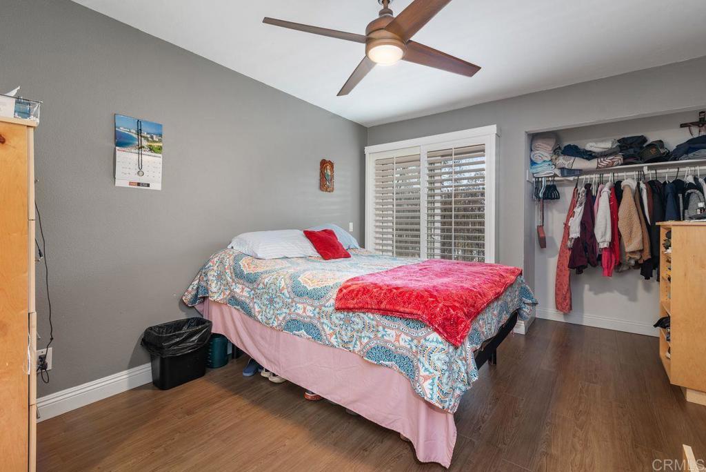 2340 Hosp Way, Unit 120 Carlsbad, CA 92008 - Photo 25 of 33 a bed sitting in a bedroom next to a window