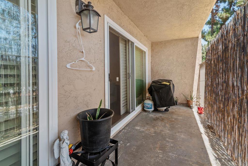 2340 Hosp Way, Unit 120 Carlsbad, CA 92008 - Photo 29 of 33 a view of a hallway with workspace and living room