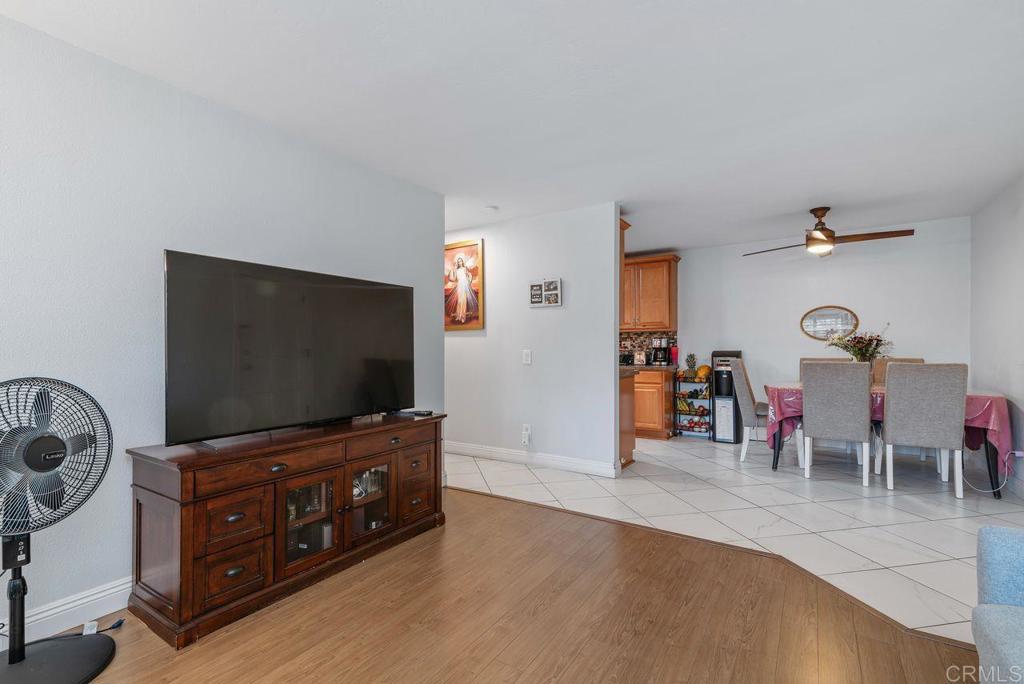 2340 Hosp Way, Unit 120 Carlsbad, CA 92008 - Photo 7 of 33 a living room with furniture and a flat screen tv