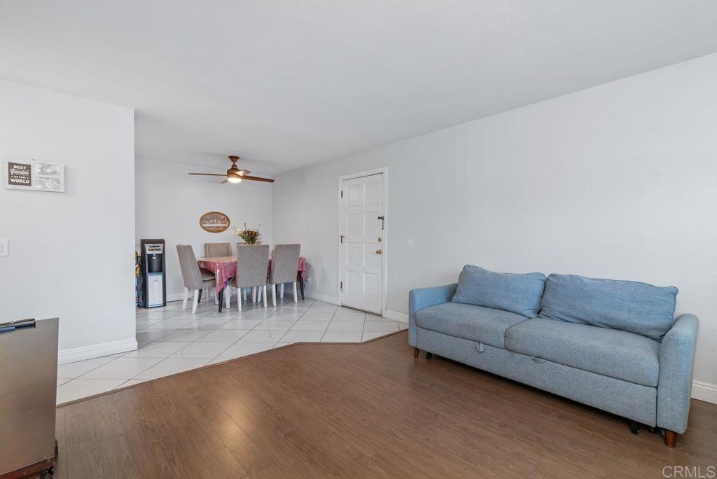 2340 Hosp Way, Unit 120 Carlsbad, CA 92008 - Photo 8 of 33 a living room with furniture and a wooden floor
