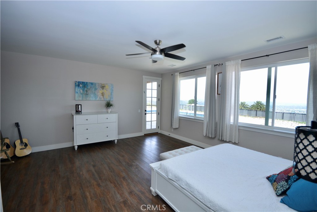 12451 Rancho Heights Road Pala, CA 92059 - Photo 12 of 46 a bed room with a bed and a window
