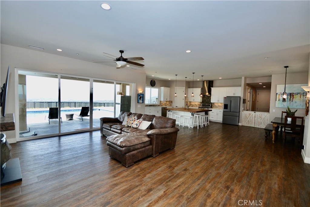 12451 Rancho Heights Road Pala, CA 92059 - Photo 24 of 46 a living room with furniture and a large window