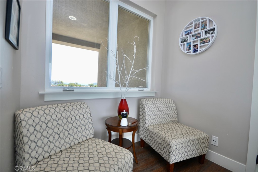 12451 Rancho Heights Road Pala, CA 92059 - Photo 27 of 46 a living room with furniture and a window