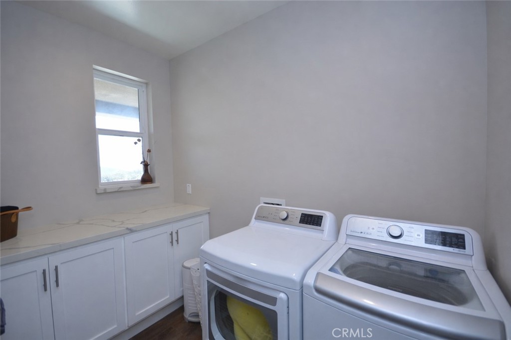 12451 Rancho Heights Road Pala, CA 92059 - Photo 28 of 46 a utility room with dryer and washer