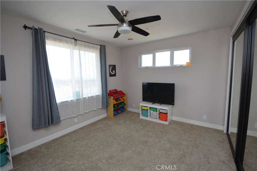 12451 Rancho Heights Road Pala, CA 92059 - Photo 31 of 46 a view of a livingroom with a flat screen tv