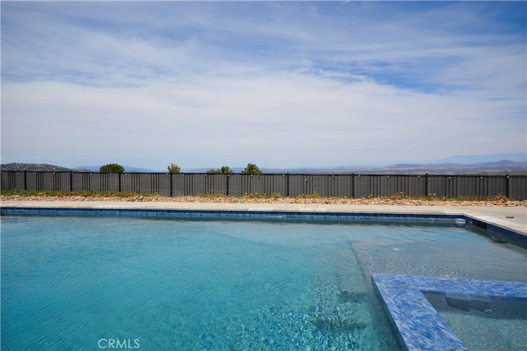 12451 Rancho Heights Road Pala, CA 92059 - Photo 33 of 46 a view of a swimming pool and an outdoor seating