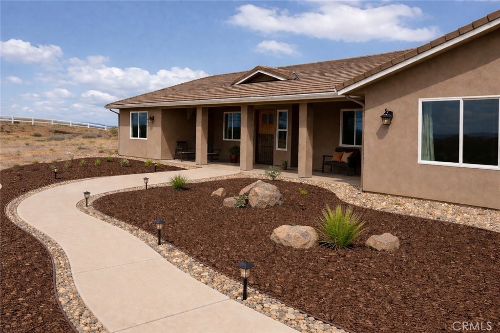 12451 Rancho Heights Road Pala, CA 92059 - Photo 43 of 46 a front view of a house with a yard