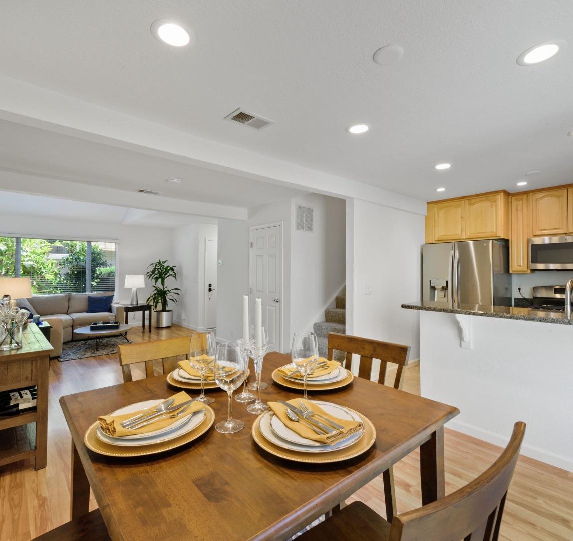 1276 Rosita Road Pacifica, CA 94044 - Photo 5 of 13 a view of a dining room with furniture and a wooden floor