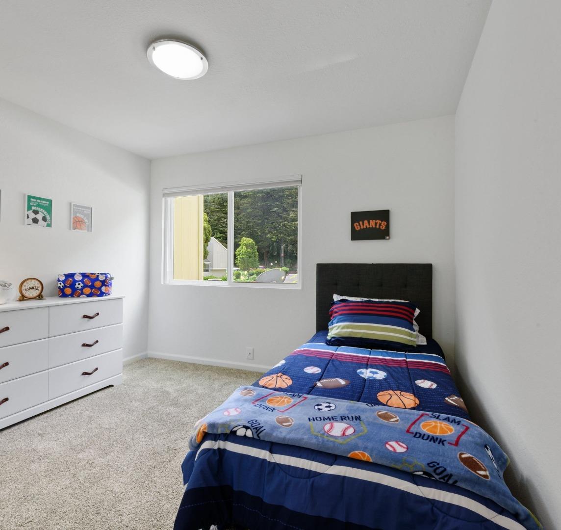 1276 Rosita Road Pacifica, CA 94044 - Photo 9 of 13 a bedroom with bed and a window