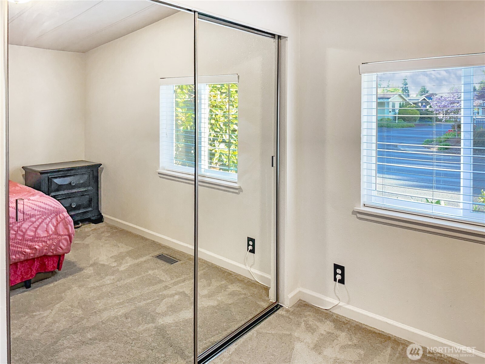 2500 South 370th Street, Unit 54 Federal Way, WA 98003 - Photo 15 of 40 a bedroom with a bed and a window