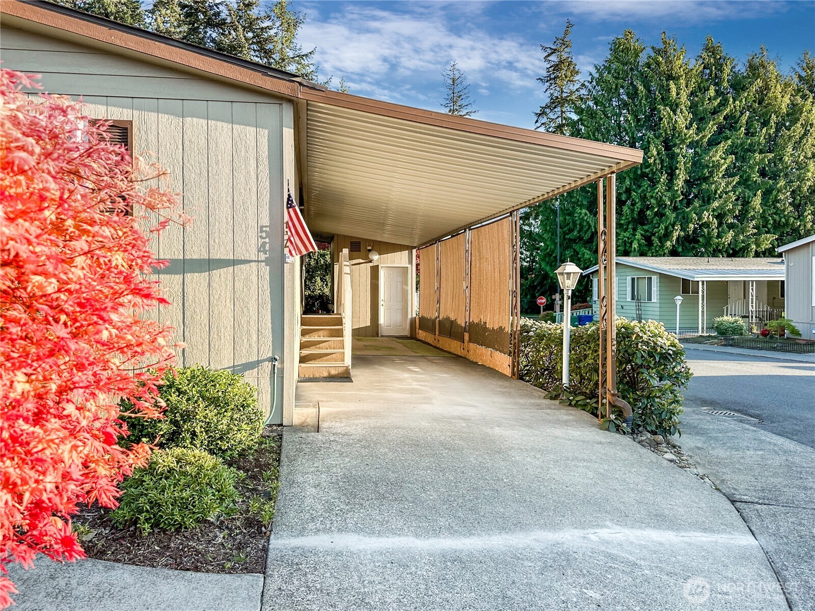 2500 South 370th Street, Unit 54 Federal Way, WA 98003 - Photo 17 of 40 front view of a house with a porch