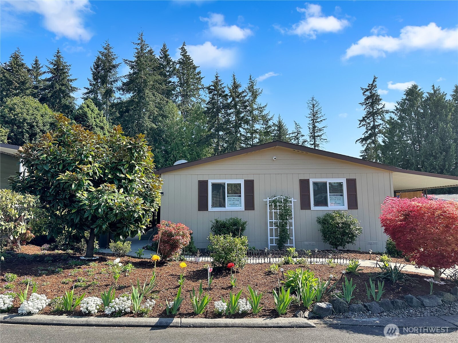 2500 South 370th Street, Unit 54 Federal Way, WA 98003 - Photo 23 of 40 a view of a house with a yard