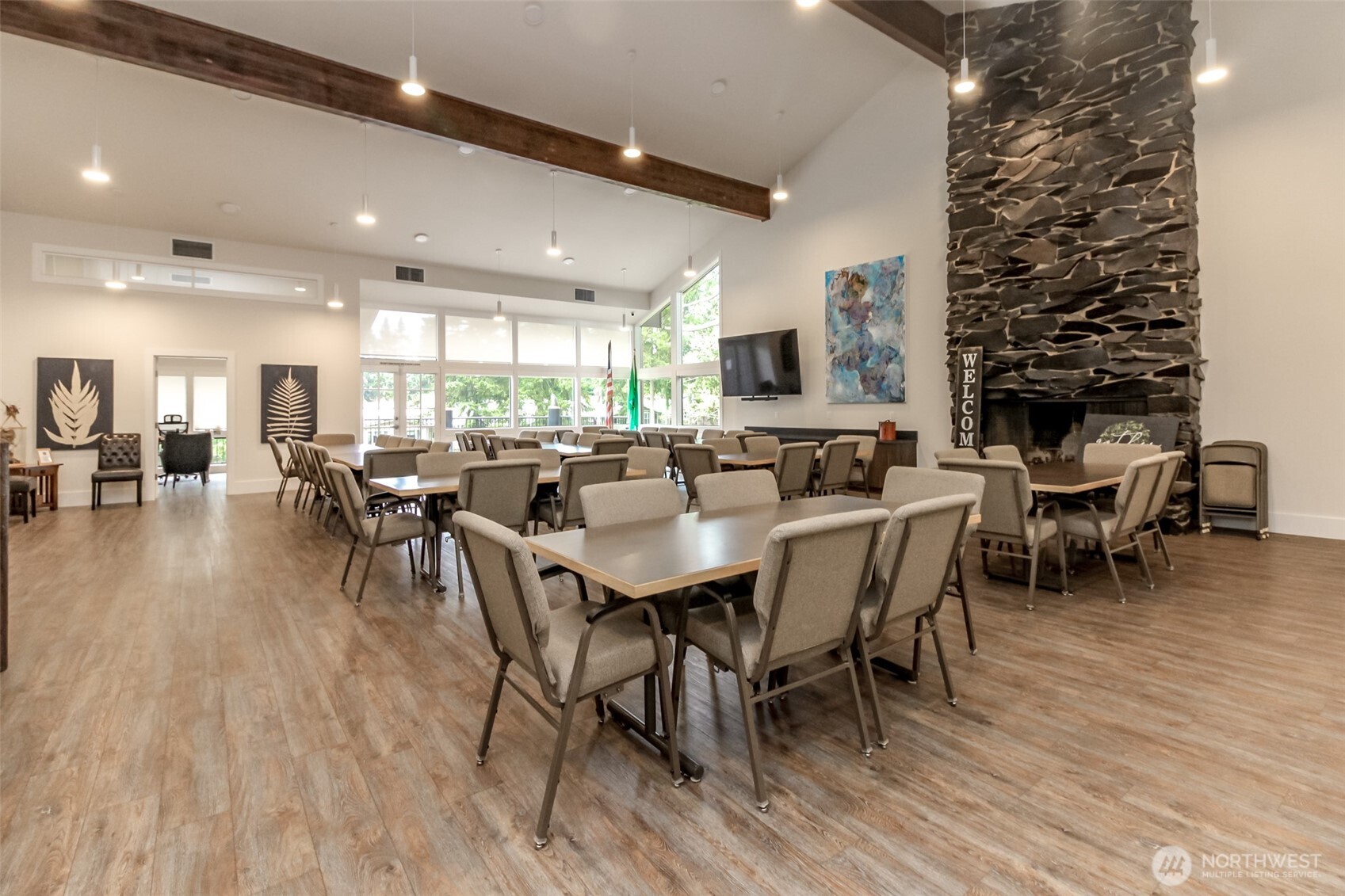 2500 South 370th Street, Unit 54 Federal Way, WA 98003 - Photo 25 of 40 a view of a dining room with furniture window and wooden floor
