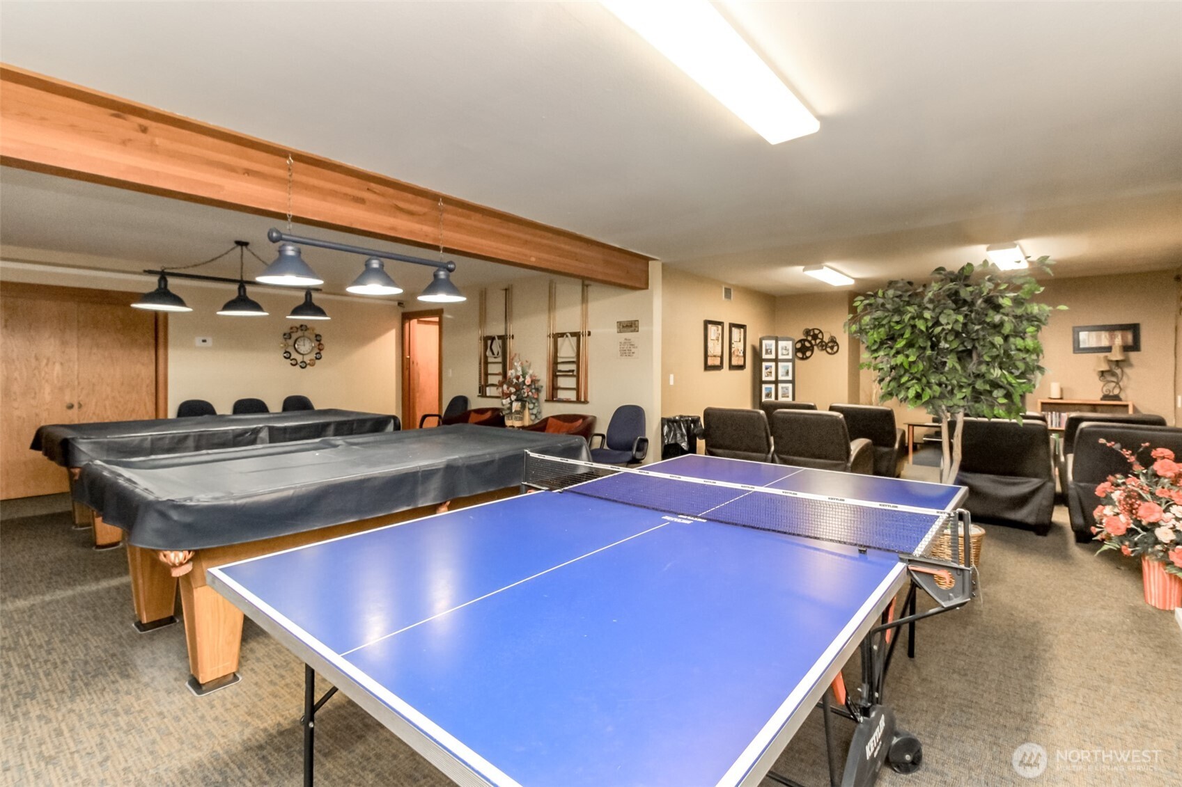 2500 South 370th Street, Unit 54 Federal Way, WA 98003 - Photo 32 of 40 a room with gym equipment and a table