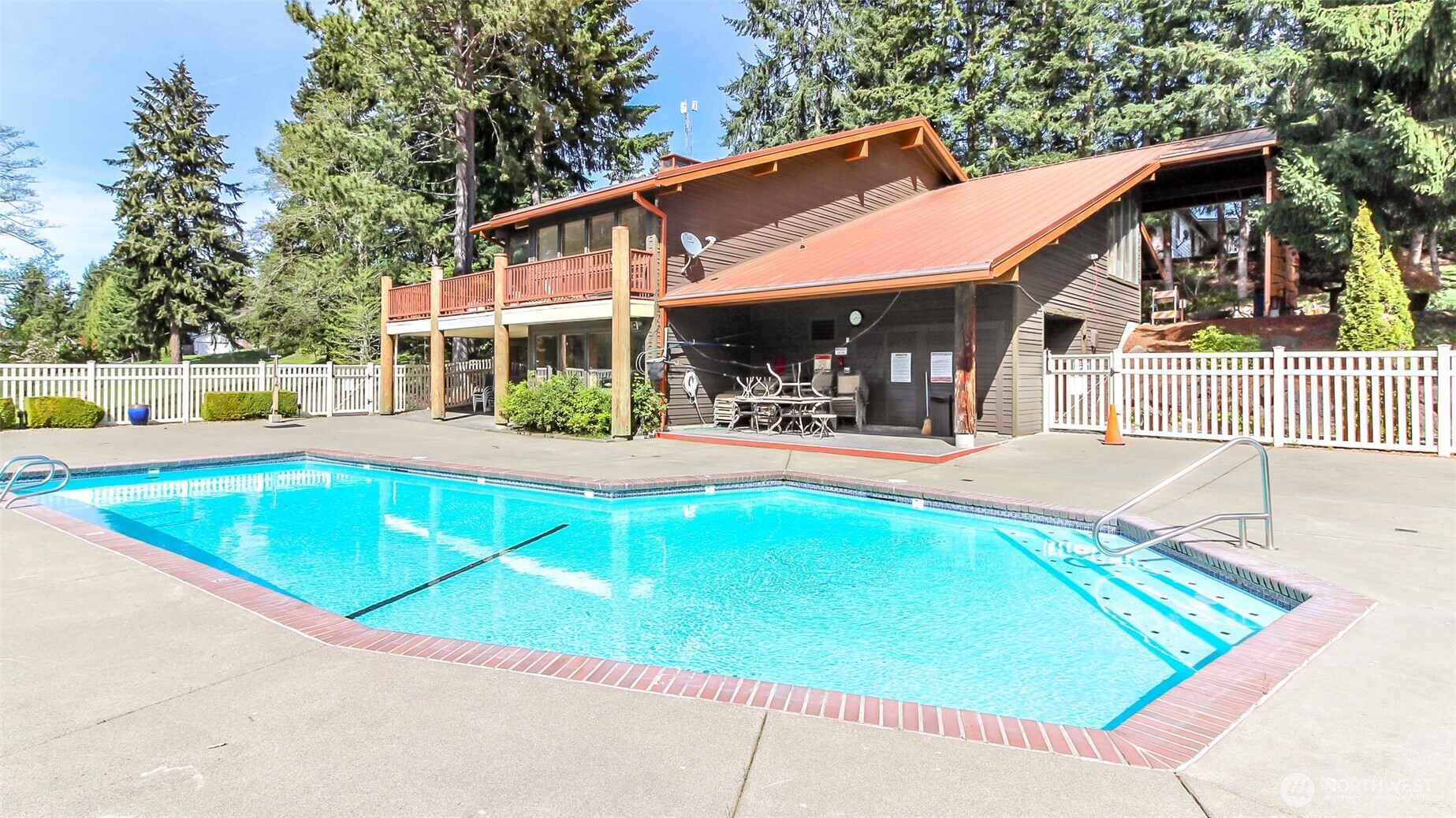 2500 South 370th Street, Unit 54 Federal Way, WA 98003 - Photo 35 of 40 an outdoor space with swimming pool and furniture