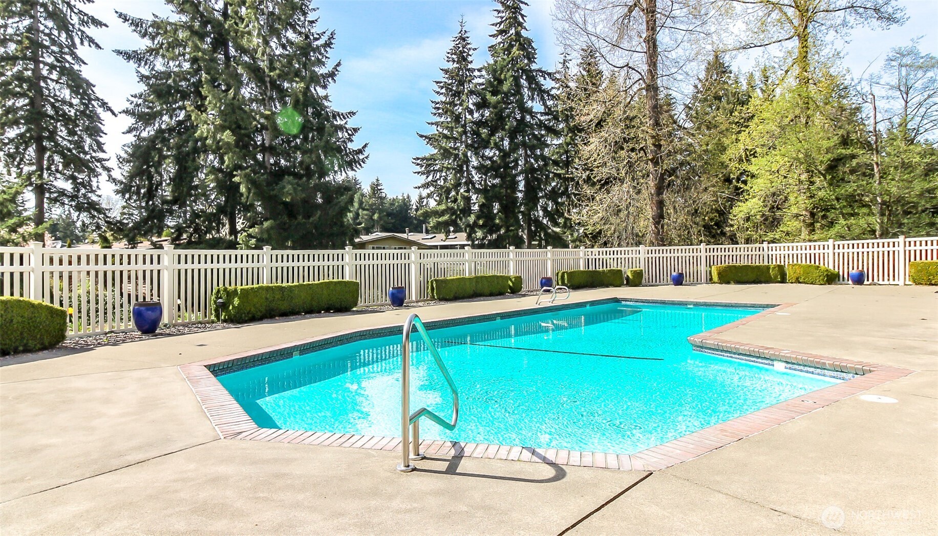 2500 South 370th Street, Unit 54 Federal Way, WA 98003 - Photo 36 of 40 a view of a swimming pool with a lounge chairs