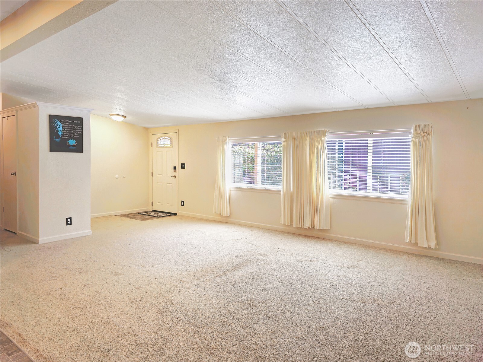 2500 South 370th Street, Unit 54 Federal Way, WA 98003 - Photo 6 of 40 an empty room with windows