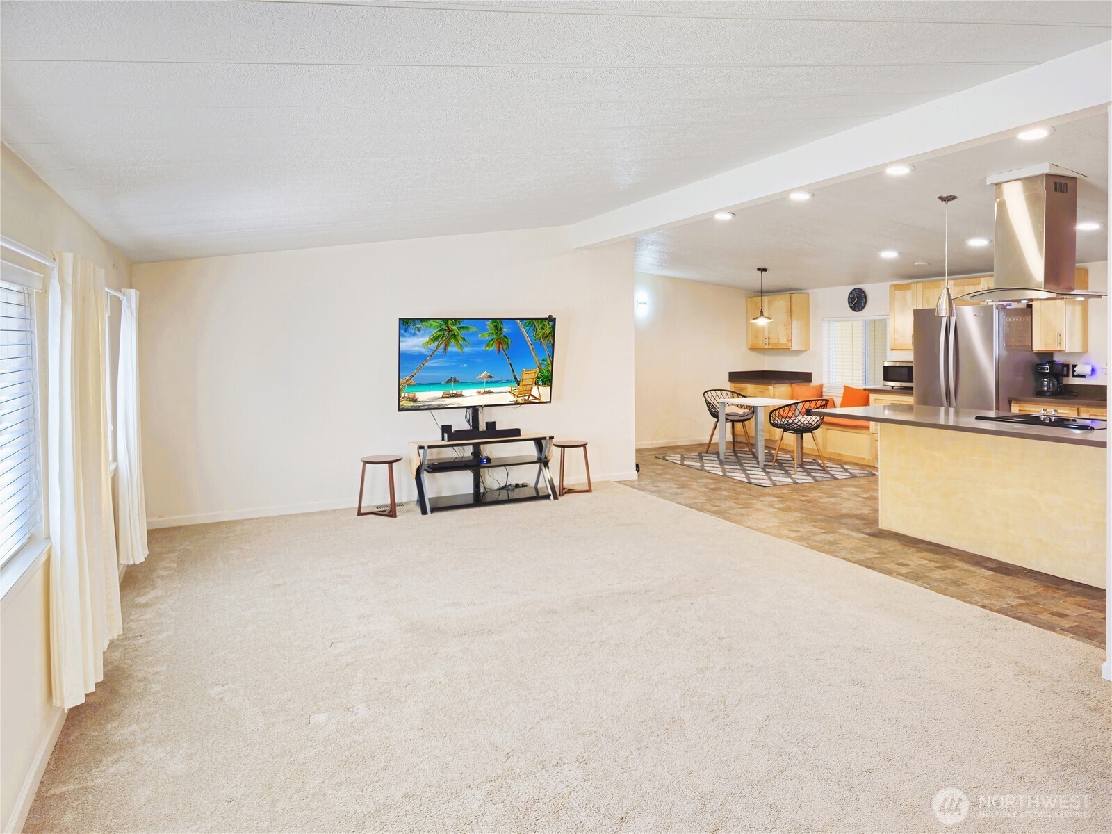 2500 South 370th Street, Unit 54 Federal Way, WA 98003 - Photo 7 of 40 a view of a livingroom with furniture and a flat screen tv
