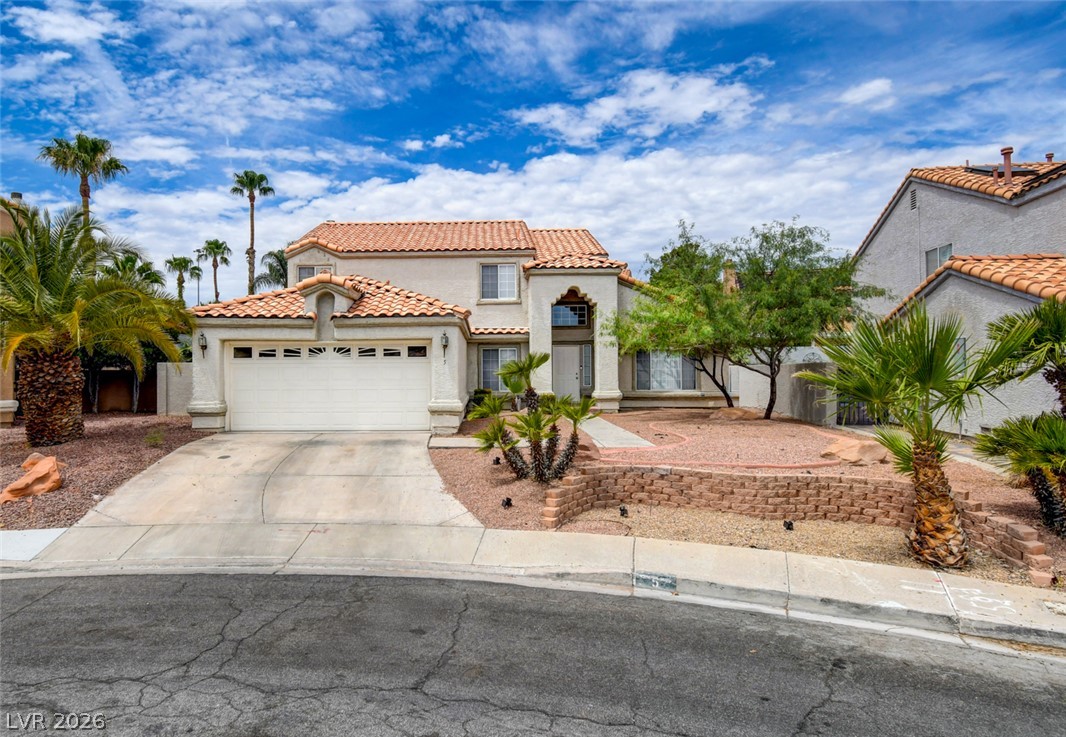 5 Tarryall Terrace Henderson, NV 89074 - Photo 2 of 44 A well-maintained facade with Mediterranean-inspired architecture welcomes you home.