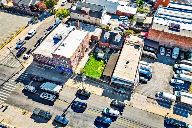 an aerial view of a house with a garden