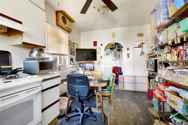 a view of a workspace with furniture