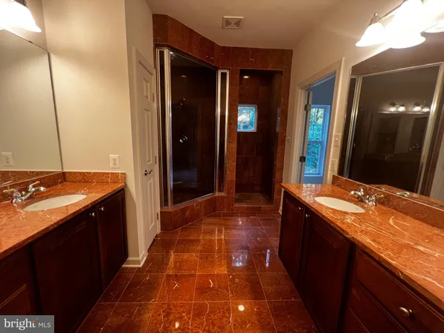 a bathroom with a toilet and a sink