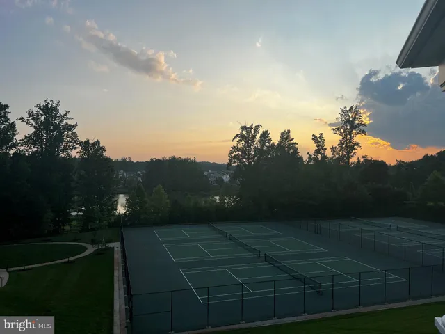 a view of a swimming pool and an outdoor space